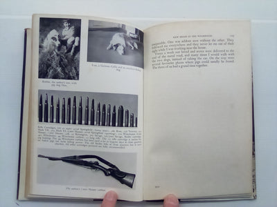 Two Dogs and a Rifle (1968) by Ken Cuthbertson