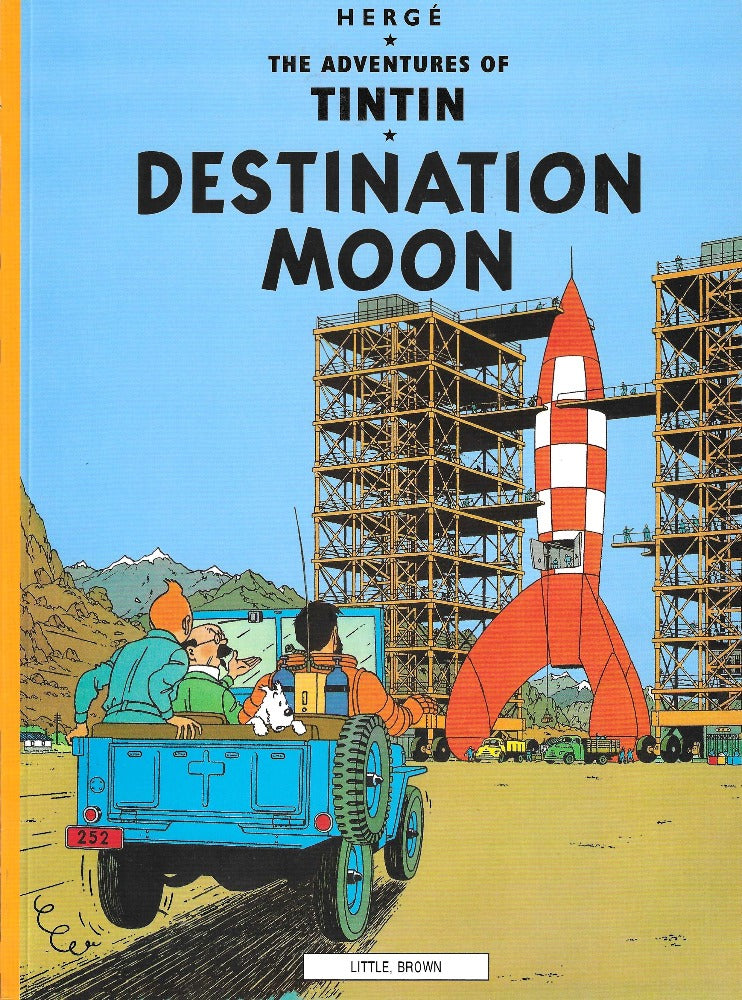 This image is of the cover for a new copy of Destination Moon by Hergé. Note: we put each of our Tintin books in a comic bag.